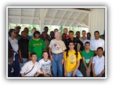 2LT ALI OROU, behind the left shoulder of former US President Jimmy CARTER during a Field Training Program devoted to International Peace and Understanding at Plains, Georgia, USA in 2009.